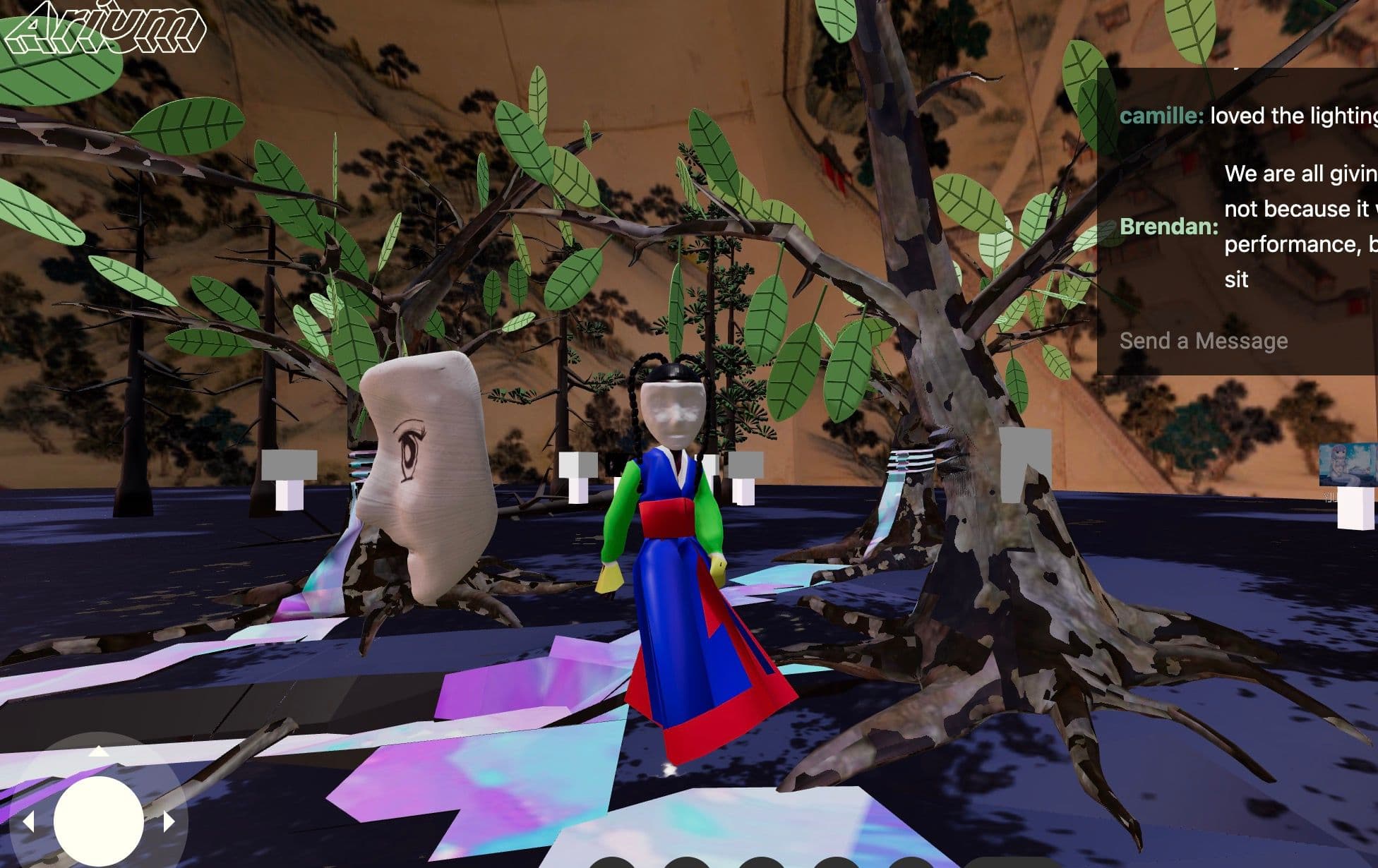 A digital avatar wearing a cream mask and traditional Asian dress stands in the center of the space, next to a tree with long roots and branches. Next to the avatar there is a floating mask looking to the left.