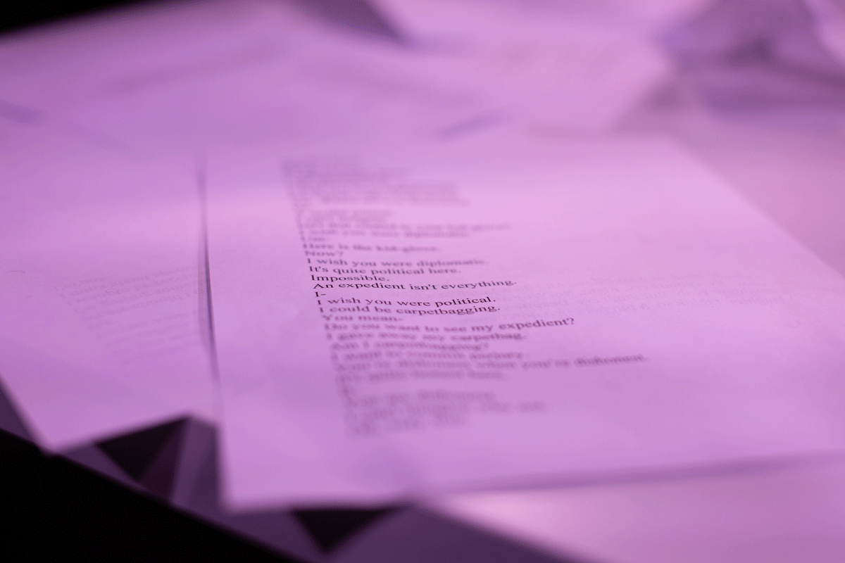 A shallow depth of field close up of a sheet of paper with printed text on it.